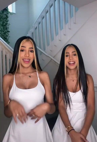 Sexy Melanie & Meila Shows Cleavage in White Dress