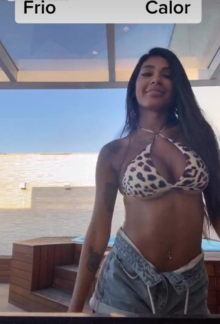 1. Cute Jully Oliveira Shows Cleavage in Leopard Bikini Top