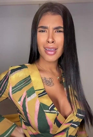 3. Hot Jully Oliveira Shows Cleavage in Floral Overall