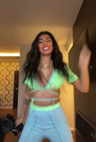 4. Desirable Jully Oliveira in Light Green Crop Top