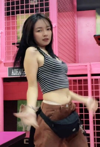 3. Sexy Rosemarie Tan in Striped Crop Top