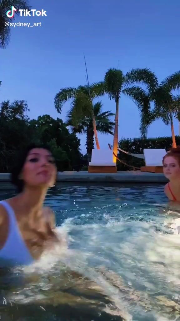 Cute Sydney Morgan Shows Cleavage in Bikini at the Pool nudeformat