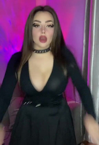 Hot Vai Monroe Shows Cleavage in Black Dress