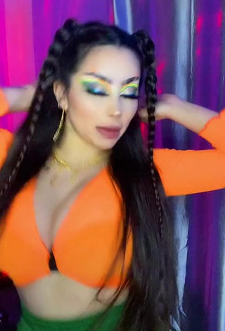 Cute Vai Monroe Shows Cleavage in Orange Crop Top and Bouncing Boobs