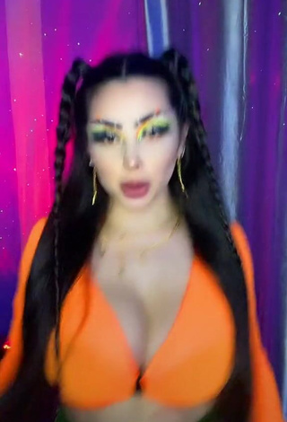 4. Cute Vai Monroe Shows Cleavage in Orange Crop Top and Bouncing Boobs