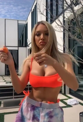 3. Sexy Abby Rao Shows Cleavage in Orange Bikini Top