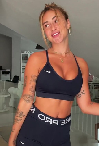 1. Beautiful Abril Cols Shows Cleavage in Sexy Black Sport Bra