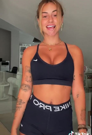 4. Beautiful Abril Cols Shows Cleavage in Sexy Black Sport Bra