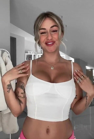 1. Pretty Abril Cols Shows Cleavage in White Crop Top