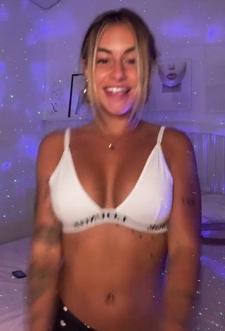 Desirable Abril Cols Shows Cleavage in White Sport Bra