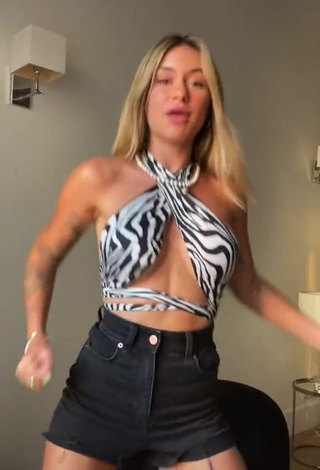 1. Wonderful Abril Cols Shows Cleavage in Zebra Crop Top