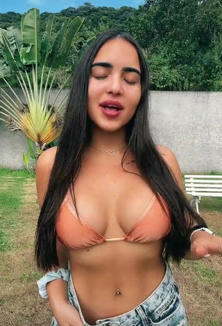 1. Hottie Aline Borges Shows Cleavage in Peach Bikini Top