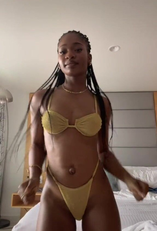 1. Desirable Angel Ogbonna in Golden Bikini