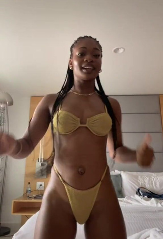 Desirable Angel Ogbonna in Golden Bikini