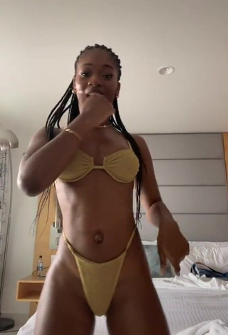 3. Desirable Angel Ogbonna in Golden Bikini