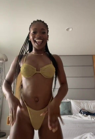 4. Desirable Angel Ogbonna in Golden Bikini