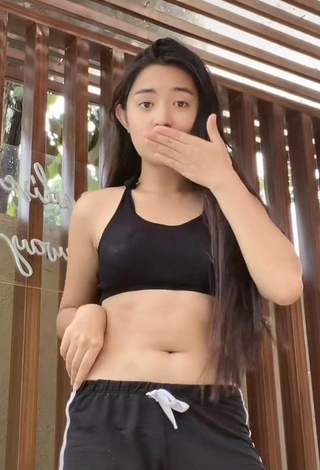 1. Hot Ashy Amadure in Black Crop Top