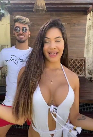 Desirable Ayarla Souza Shows Cleavage in White Swimsuit