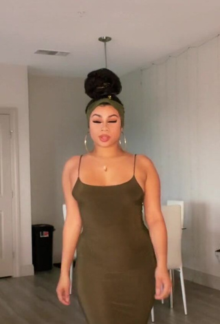 1. Beautiful BbygShai in Sexy Olive Dress