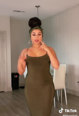 3. Beautiful BbygShai in Sexy Olive Dress