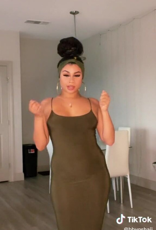 4. Beautiful BbygShai in Sexy Olive Dress