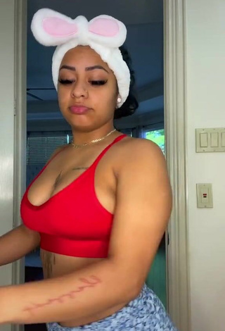 Hot Carmen Pritchett Shows Cleavage in Red Sport Bra