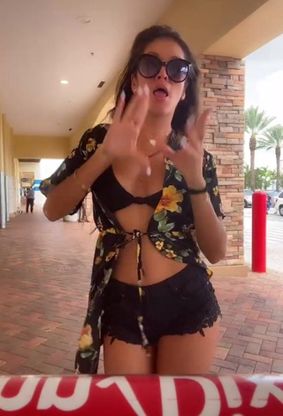 4. Hot Andrea Shows Cleavage in Black Bikini Top