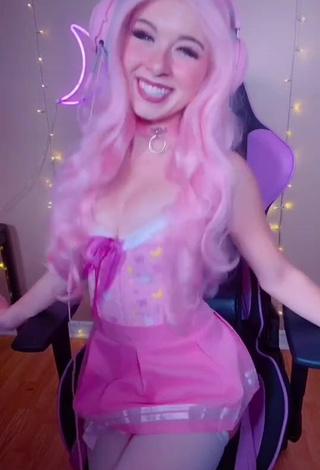 Hot dessyyc Shows Cleavage in Pink Corset